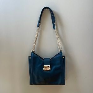 Black medium sized Michael Kors shoulder/arm bag, adjustable gold chain strap